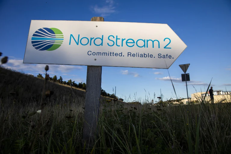A road sign directs traffic to the entrance of the Nord Stream 2 gas pipeline in Lubmin, north-east Germany.