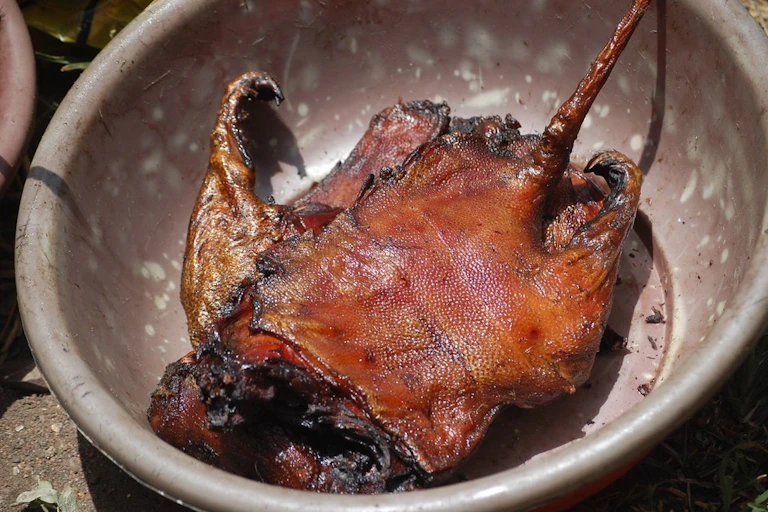 Roasted bushmeat in a pan