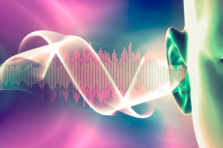 An illustration of auditory waves entering the ear.