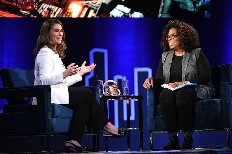 Melinda French Gates (left), being interviewed by Oprah Winfrey