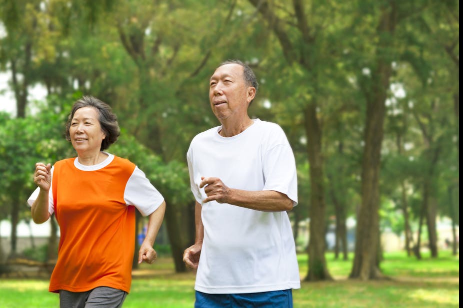 Older couple on a jog together.