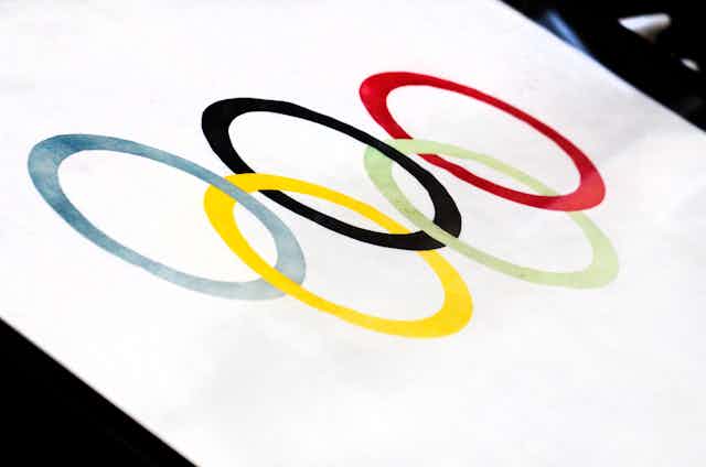 Olympic rings on a white background.