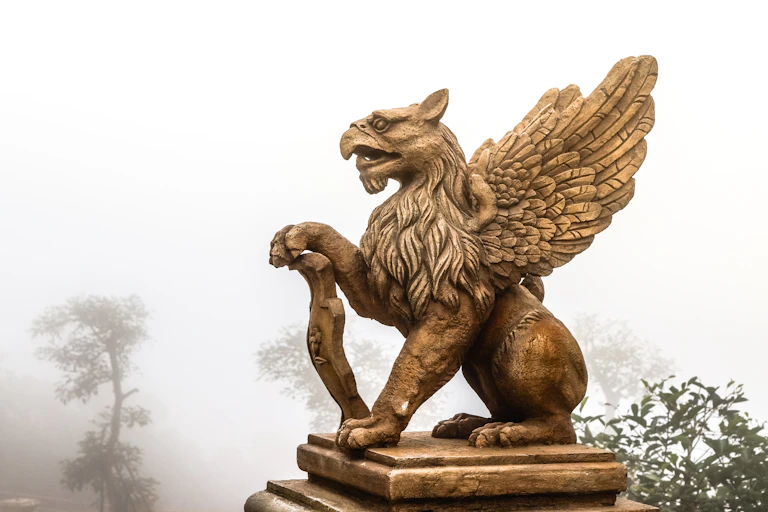 stature of a griffin with the body of a lion, the head and wings of an eagle