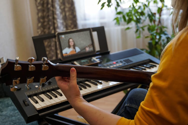 A music student does a lesson over Zoom