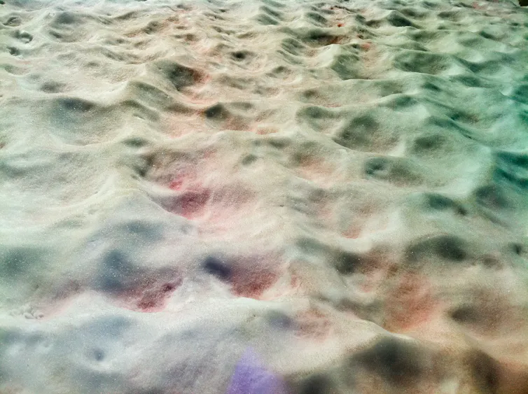 Coloured, dimpled snow