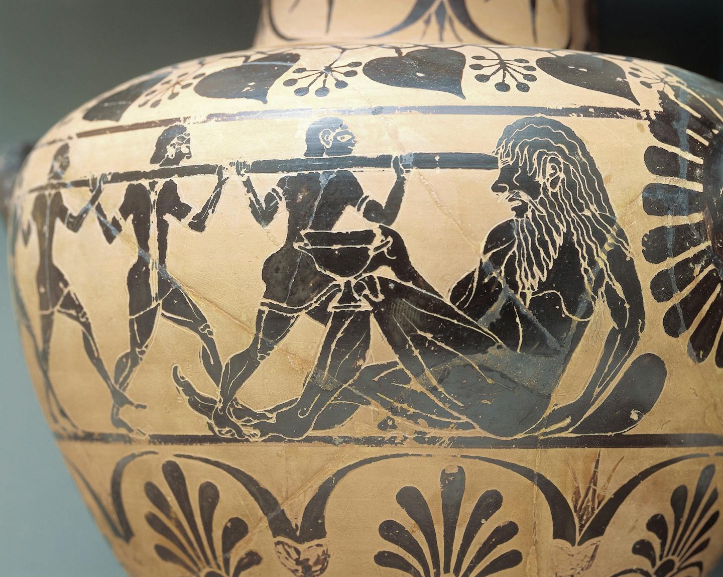 Etruscan pottery with black figures blinding the cyclops with a spear