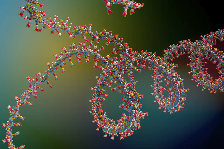 A graphical image of a spiral studded with tiny spheres