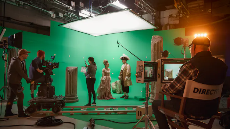 Director and camera crew on film set