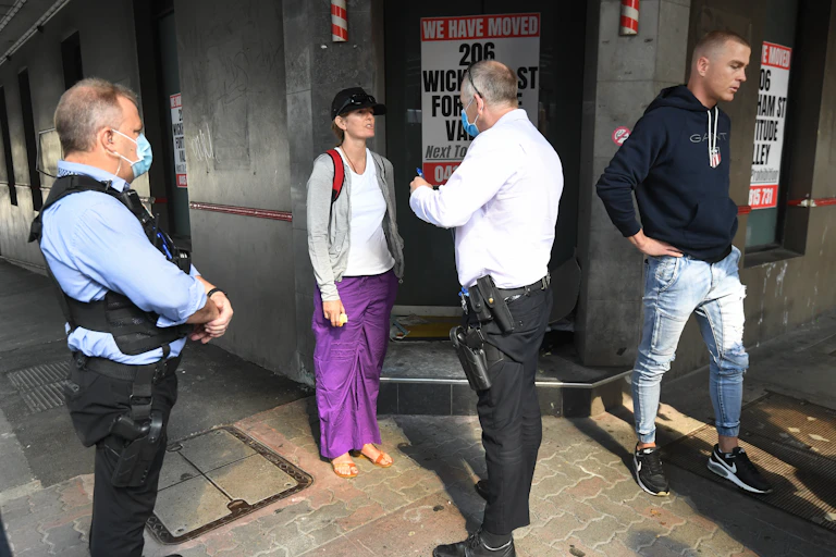Police stopping someone in Brisbane