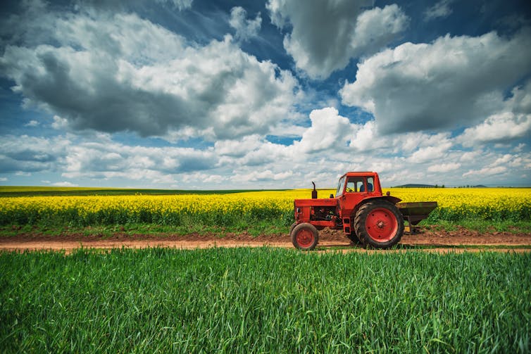 A tractor moving across a field