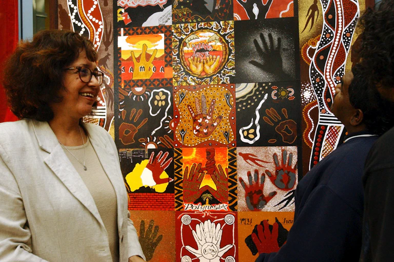 Aboriginal elder Joy Murphy attending the unveiling of a mural painted by Indigenous people in prison.