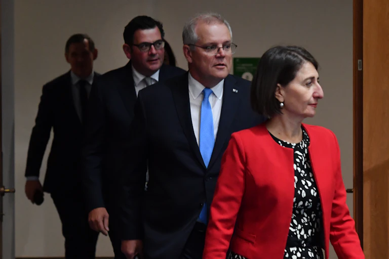 Members of the national cabinet arriving at a meeting