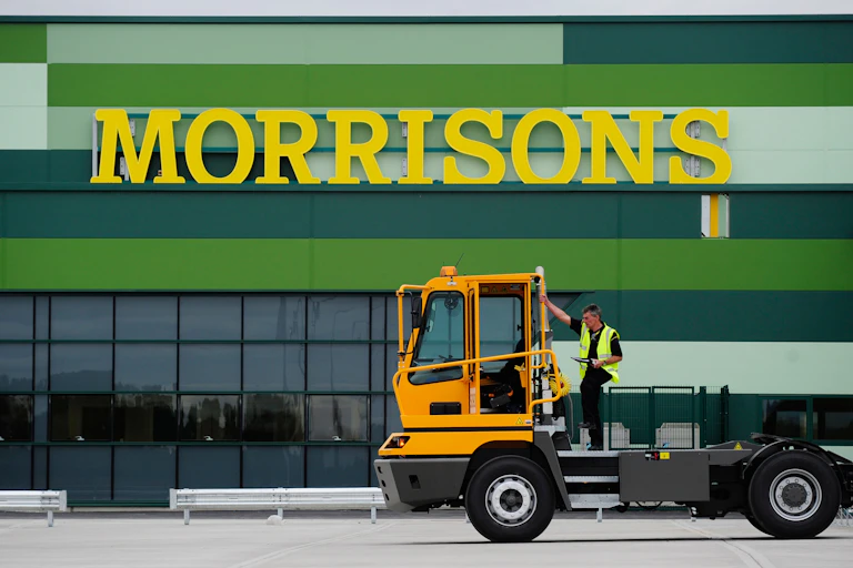 A truck in front of a Morrisons supermarket