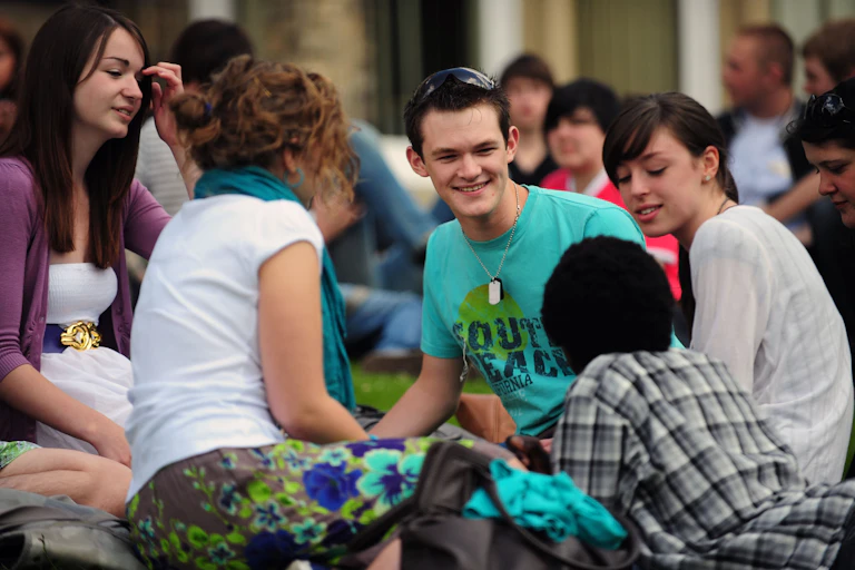 Sixth formers socialising outside during a break