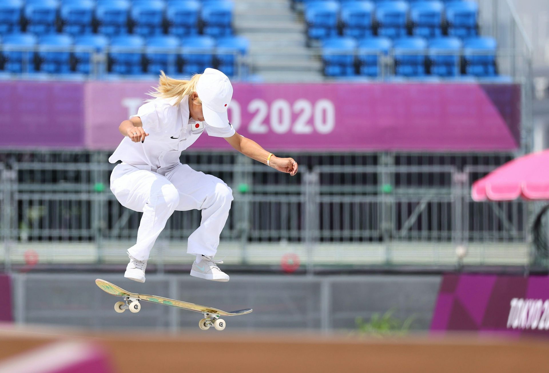 Skatboarder in all white.