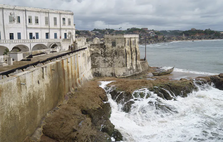 Waves are seen crashing at the base of the Cape Coast Castle.