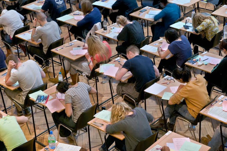 Students sitting for an exam.