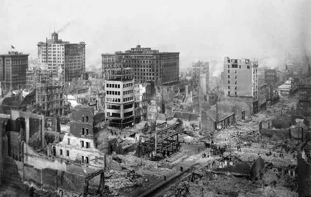 Black and white photograph of destroyed urban blocks
