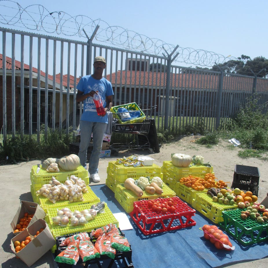 Men selling fruit.