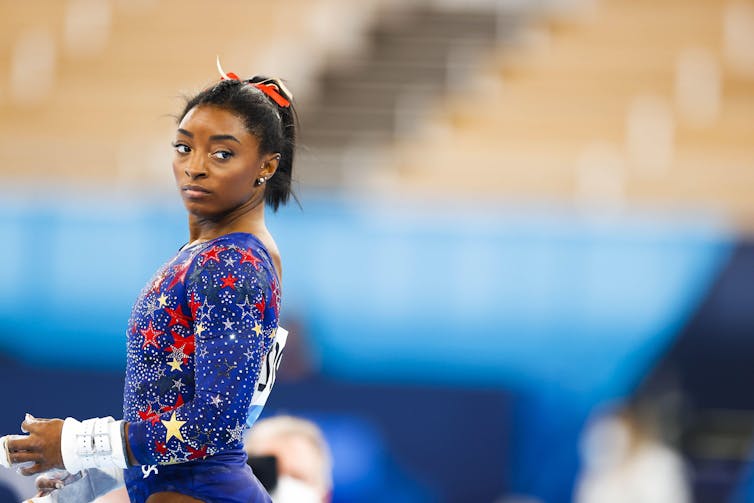 Simone Biles in a star-spangled leotard.