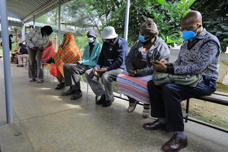 A queue of people at a vaccination centre in Kenya