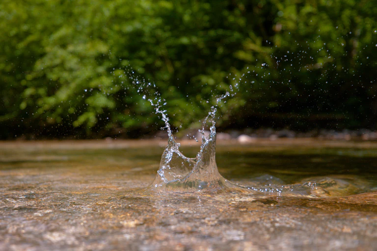 Splash in clear river water.