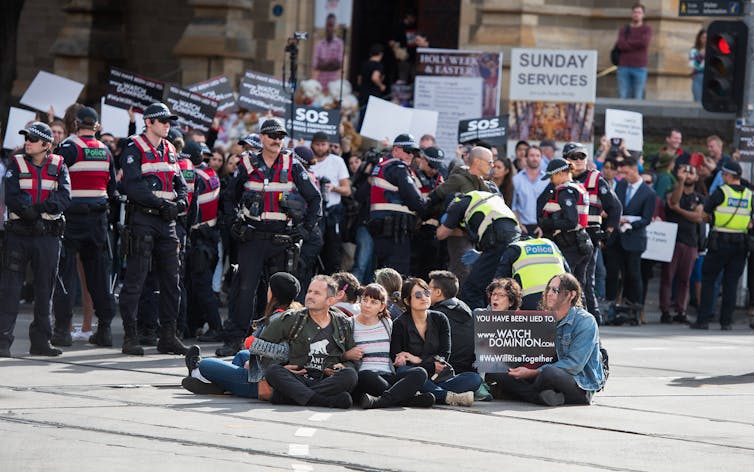 Animal rights activists block a Melbourne CBD intersection in 2019.
