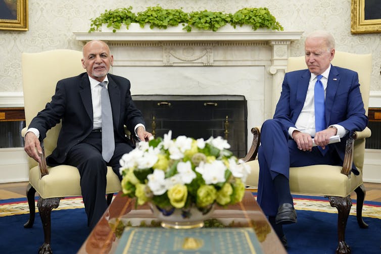 President Joe Biden meeting with Afghan President Ashraf Ghani.