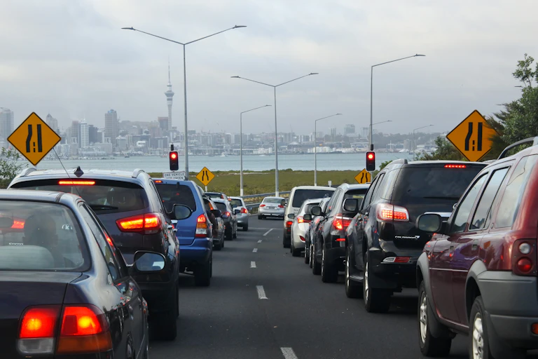 traffic jam on Auckland motorway with city in background