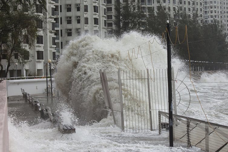 Waves caused by Typhoon Hato in August 2017 crash over a sea wall in Hong Kong.
