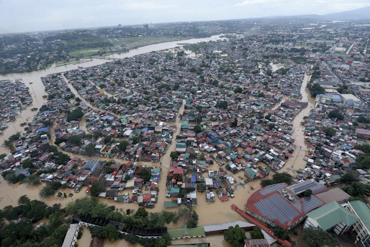 Floodwaters inundate Manila suburbs in November 2020 following Typhoon Vamco.