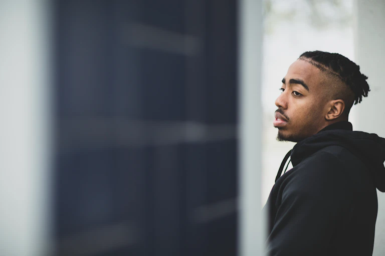 Young man looking into distance