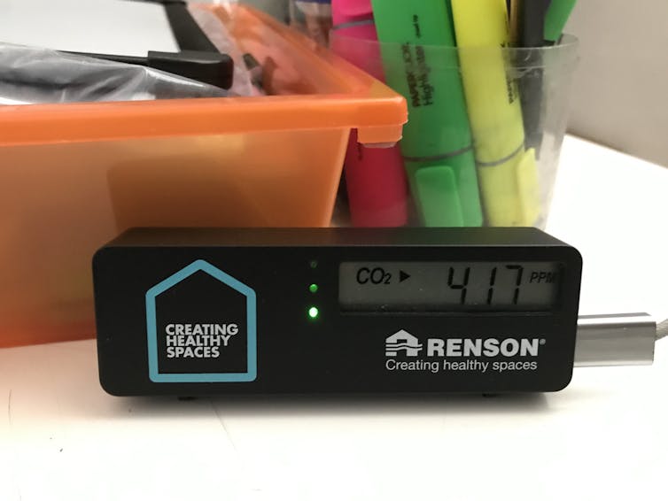 CO₂ monitor in school showing 417ppm