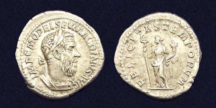 The front and back of a gold coin.