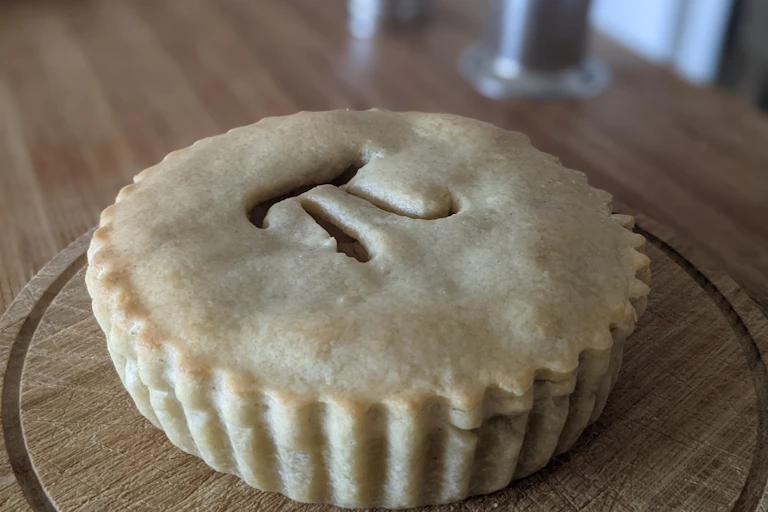 Pie with a pi symbol on top