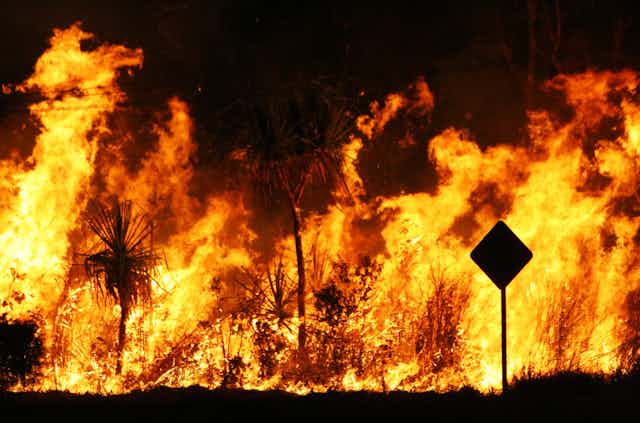 Fire raging in an Australian landscape at night
