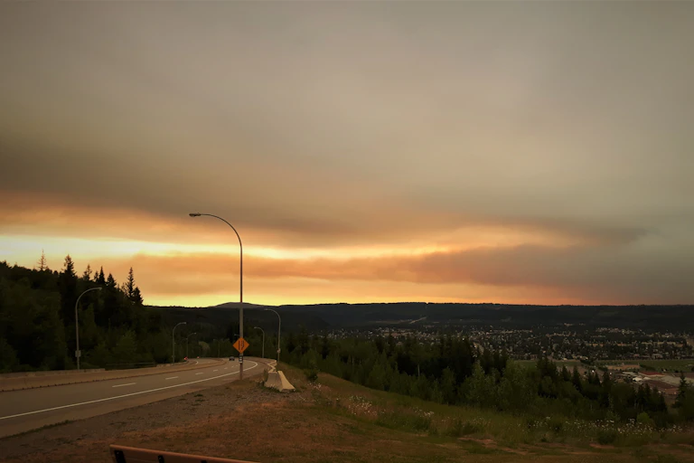A smoky sky over a town