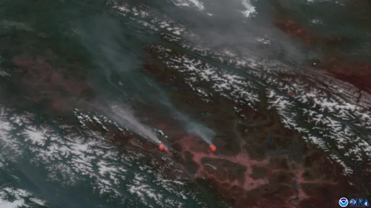 Short animation of satellite imagery of smoke and wildfires generating lightning.