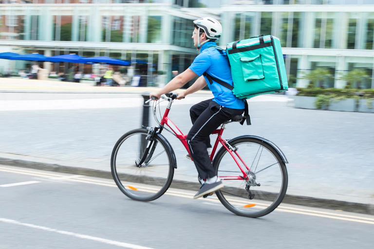 Delivery cyclist at work.