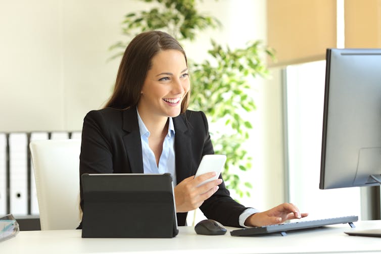 happy woman reading emails