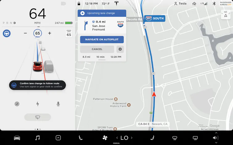 Screenshot of a display with the left third showing an icon of a car on a road and the right to third showing a map
