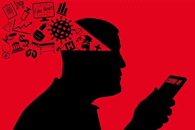 Vector illustration of a shilouette of a person holding phone reading "COVID-19" on the screen, a variety of pandemic-related images spilling out of his head.