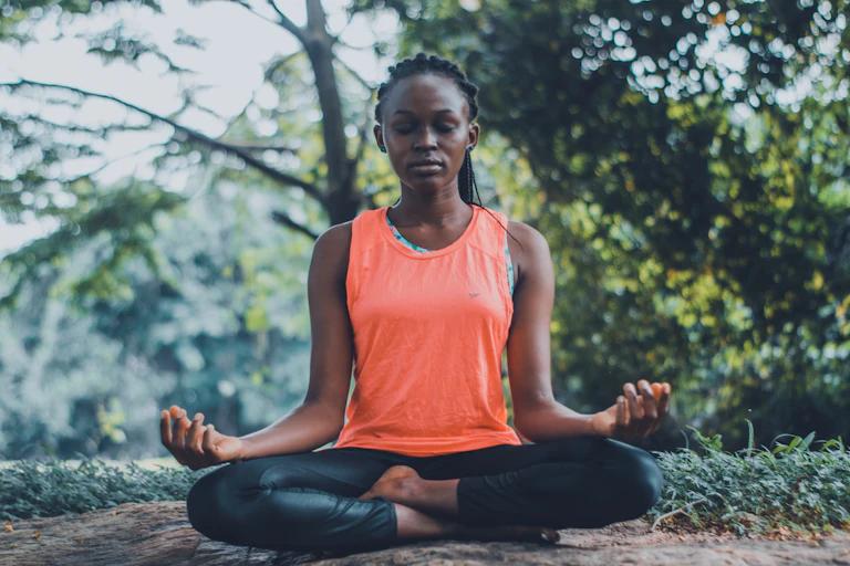 Woman meditating outside