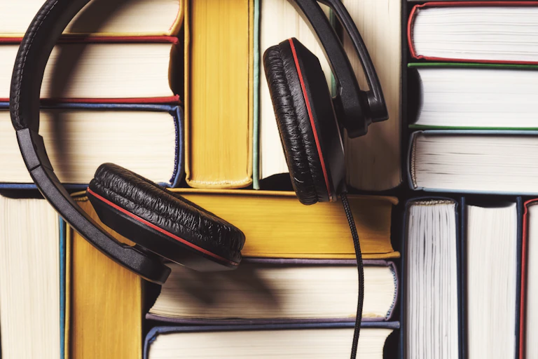 headphones on books