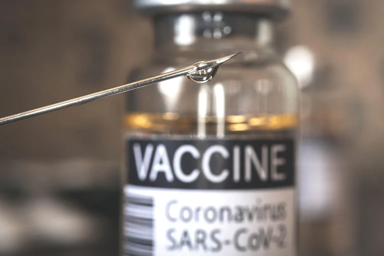 Close up of a syringe.