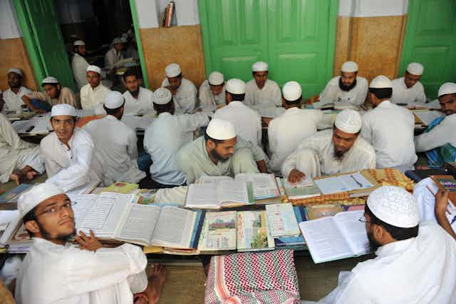Muslim students prepare for their entry exams on campus of the Darul Uloom Deoband school of Islam in the north Indian state of Uttar Pradesh.