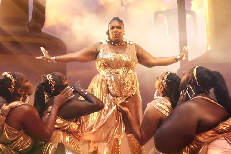 lizzo gold dress Lizzo shines in sheer dress on BET Awards 2026 red carpet