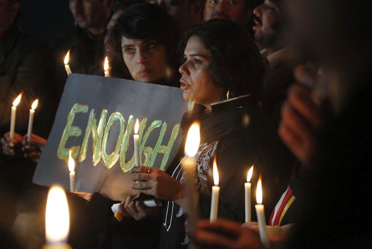 Candlelight vigil for the victims of a school attack.