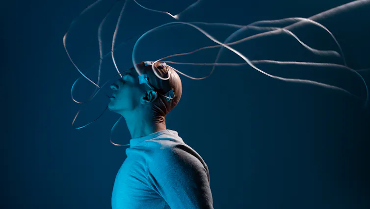 An illustration of a man with wires coming out of his head