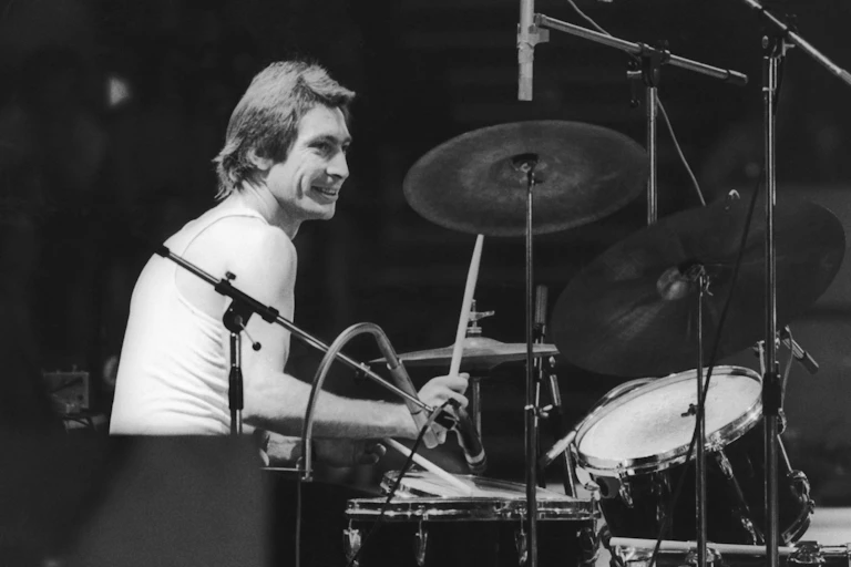 Drummer Charlie Watts of the Rolling Stones sitting behind his kit.